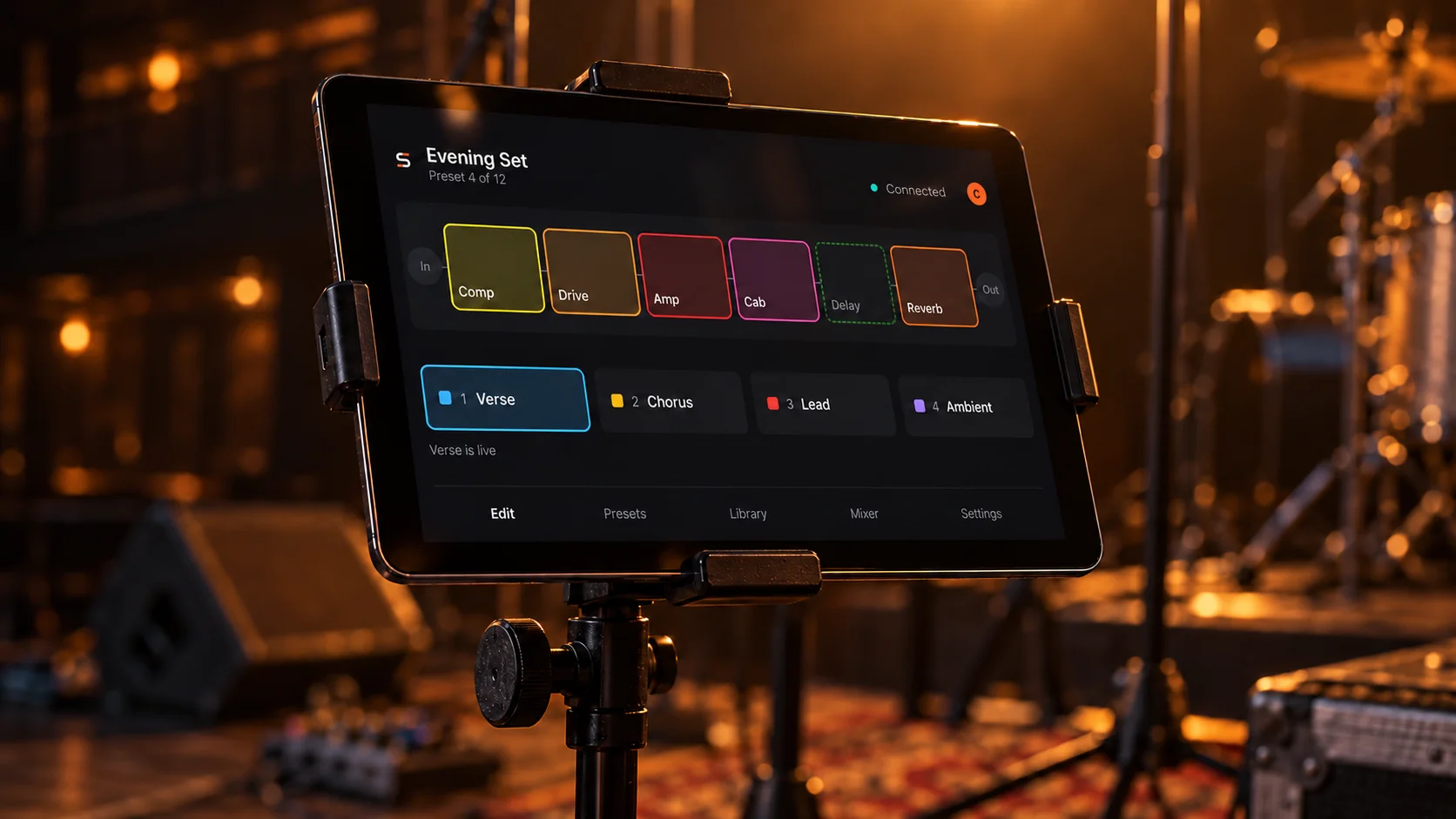 Close view of an iPad on a mic stand showing the Stagecoil signal chain and snapshots.